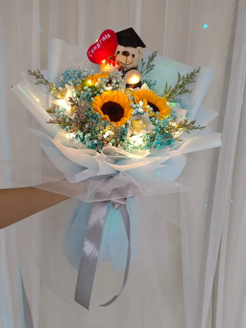 Tiffany Blue Sunflower Graduation Bouquet by Nieldelia Florist in Kajang